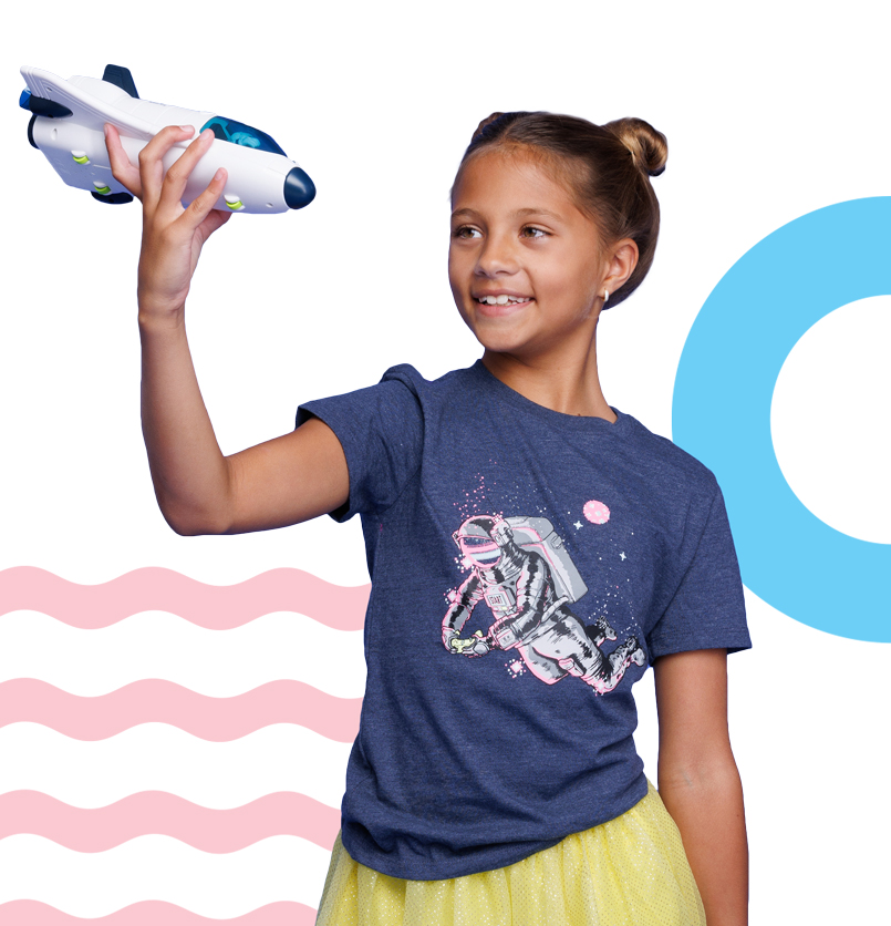 Composition image of a young student with astronaut t-shirt using her imagination while playing with a toy rocket in front of abstract shapes