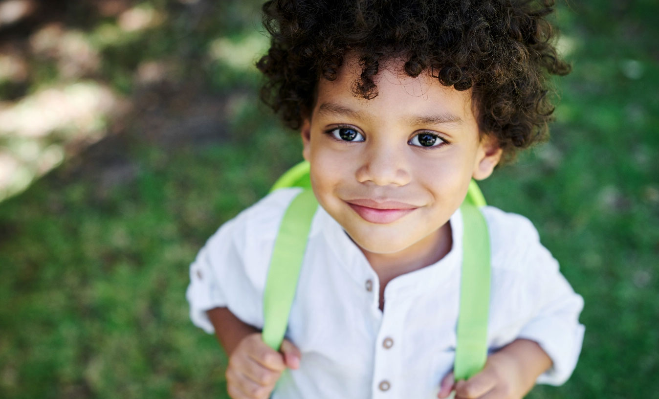 Young boy with backpack