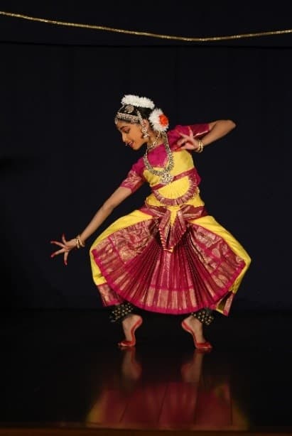 student performing in her dance production