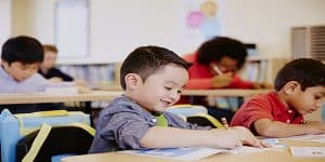 Children coloring in the classroom