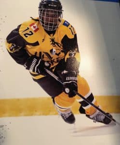 Patani playing hockey