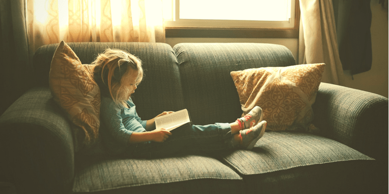 Girl Reading on the Couch