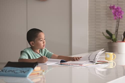 child doing homework