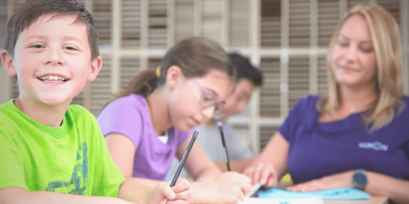 Students smiling at a Kumon Center