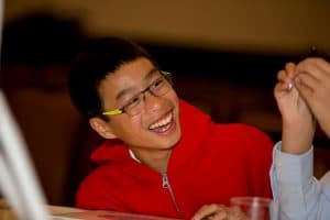 Nathan laughing at the Student Conference