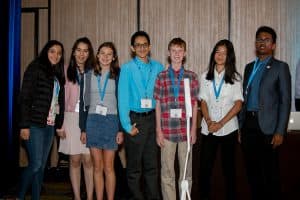 Justin with a group at the student conference