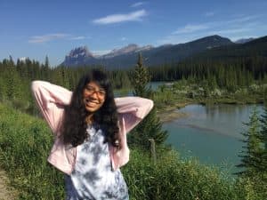 Uma poses at Banff during the student conference trip