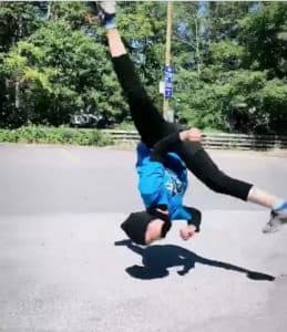 Amina cartwheels with no hands