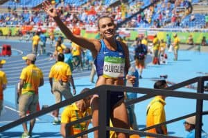 Colleen waves from the track at the Olympics