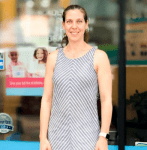 Lillian stands in front of her center