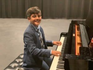 Vihaan plays the piano
