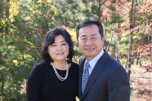 Grace poses with her husband