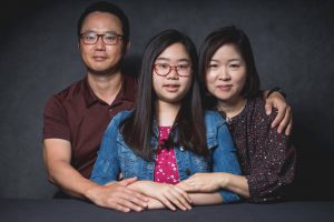 family photo with the student named Claire in the middle