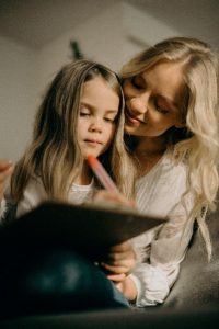 A young girl sets goals with her mother