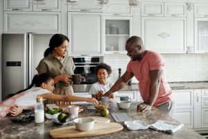 Family enoying their morning routine by having breakfast together