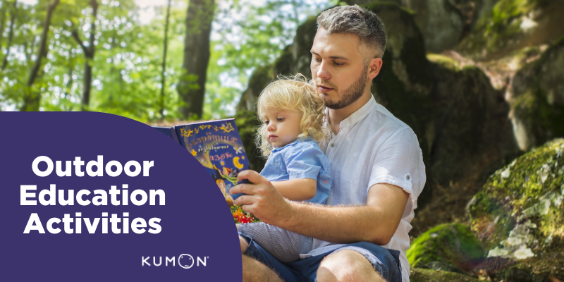 Dad and Child Reading Outside