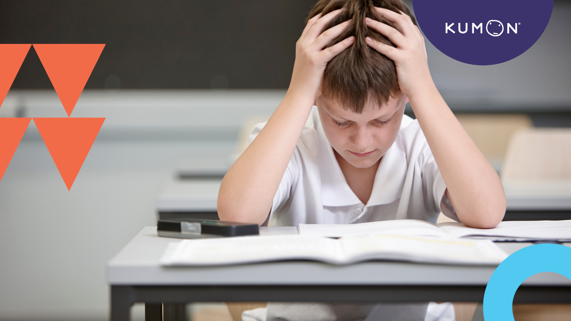 child with hands on his head