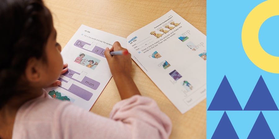 a student showing her work done while enrolled in an Effective Reading Program