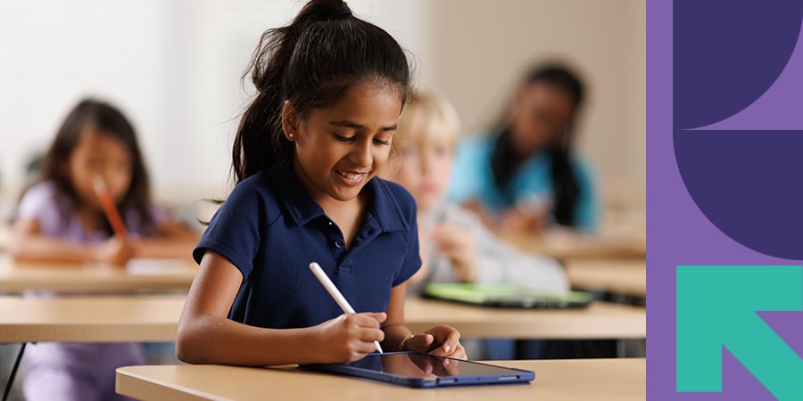 a student works on her worksheet on an ipad in her local learning center