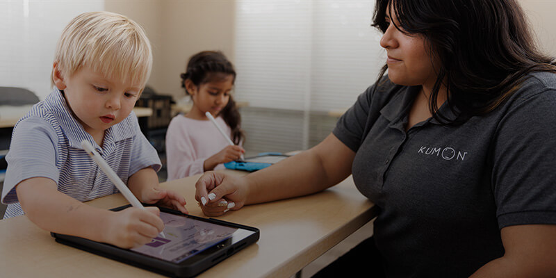 Instructor helping student